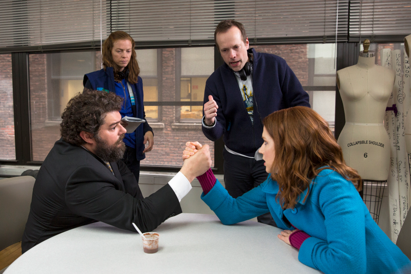 Carlock (middle), on set with Bobby Moynihan and Ellie Kemper
